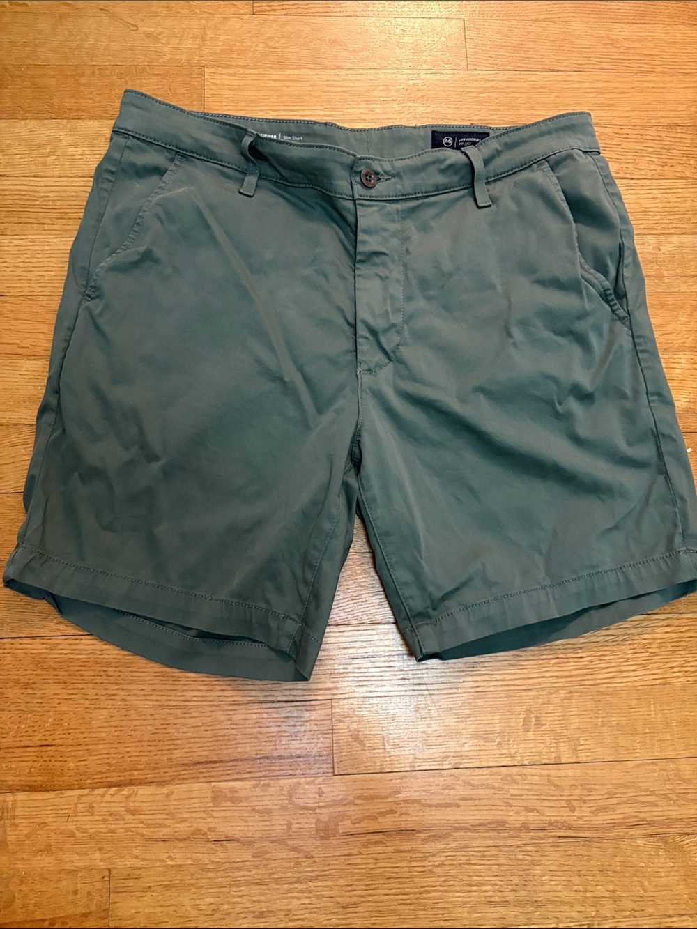 Ag Adriano Goldschmied Men's Olive Cipher shorts. W:34 7in inseam